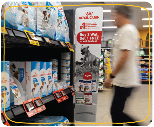 In-store retail media at the moment of purchase In-store retail media activation at Petbarn featuring point-of-purchase signage and sponsored product placement influencing shopper purchase decisions.